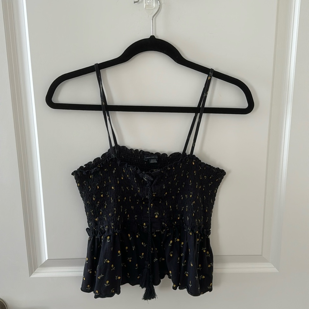 American Eagle Black Smocked Tank Top with yellow flowers and lace up front